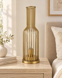Lampe de chevet en métal doré bouteille