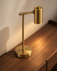 Lampe de chevet dorée sur pied