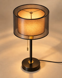 Lampe de chevet noire et dorée à double abat-jour