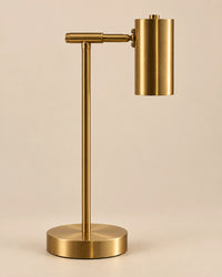 Lampe de chevet dorée sur pied